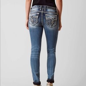 Rock Revival Mid Rise Skinny Sundee 24